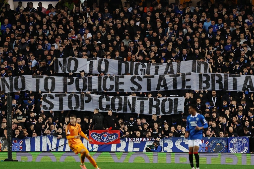 Football fans display banners against a digital ID - a plan that is highly controversial in the UK. Photo: Reuters