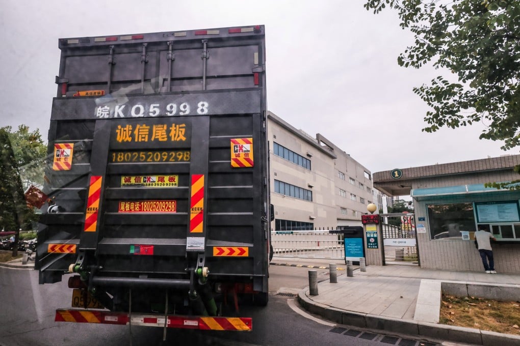 A truck waits outside the gate of Nexperia’s factory in Dongguan, Guangdong province on November 7. Photo: Reuters