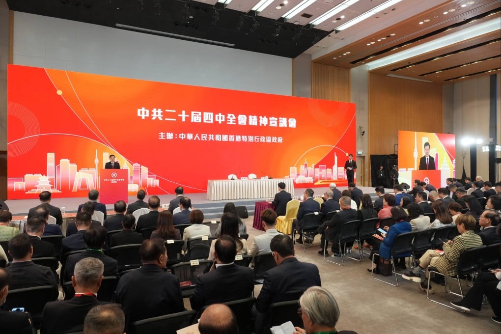 City John Lee speaks at a seminar to promote the spirit of China’s fourth plenum. Karma Lo