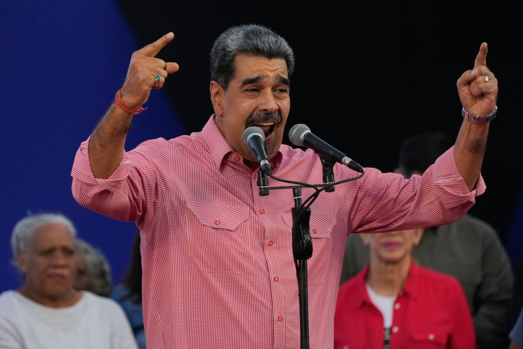Venezuelan President Nicolas Maduro addresses civilians taking an oath to join a state-organised defence network on Saturday. Photo: AP