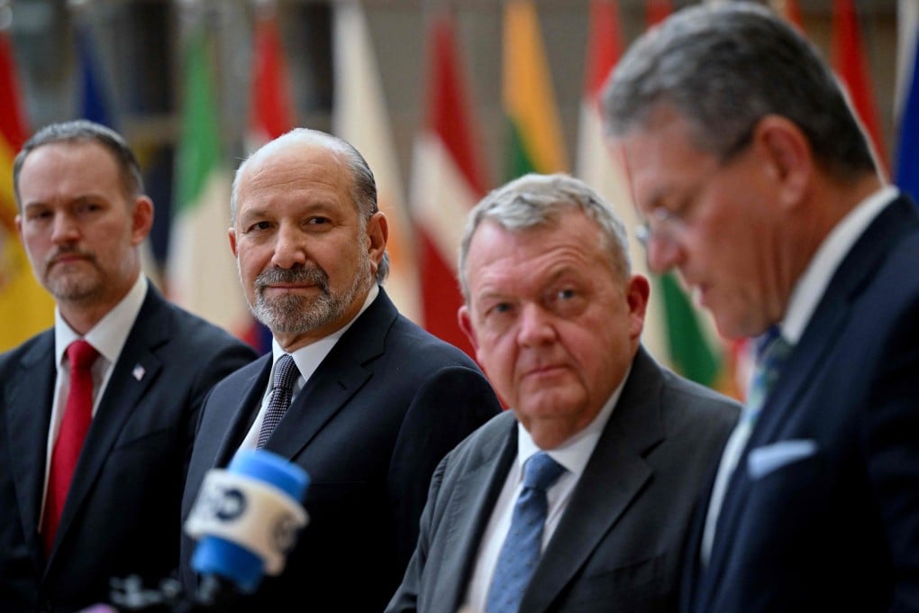 (From left) US Trade Representative Jamieson Greer, US Commerce Secretary Howard Lutnick, Danish Foreign Minister Lars Lokke Rasmussen, and EU trade and economic security commissioner Maros Sefcovic hold a joint press briefing in Brussels on Monday. Photo: AFP