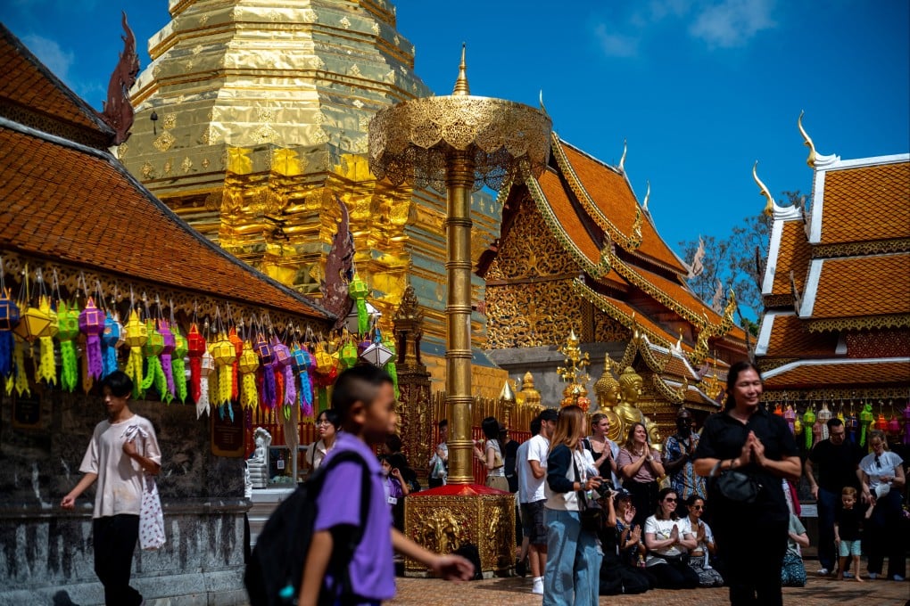 Tourists visit Wat Phra That Doi Suthep, a major tourist destination in Chiang Mai, northern Thailand. Photo: Reuters
