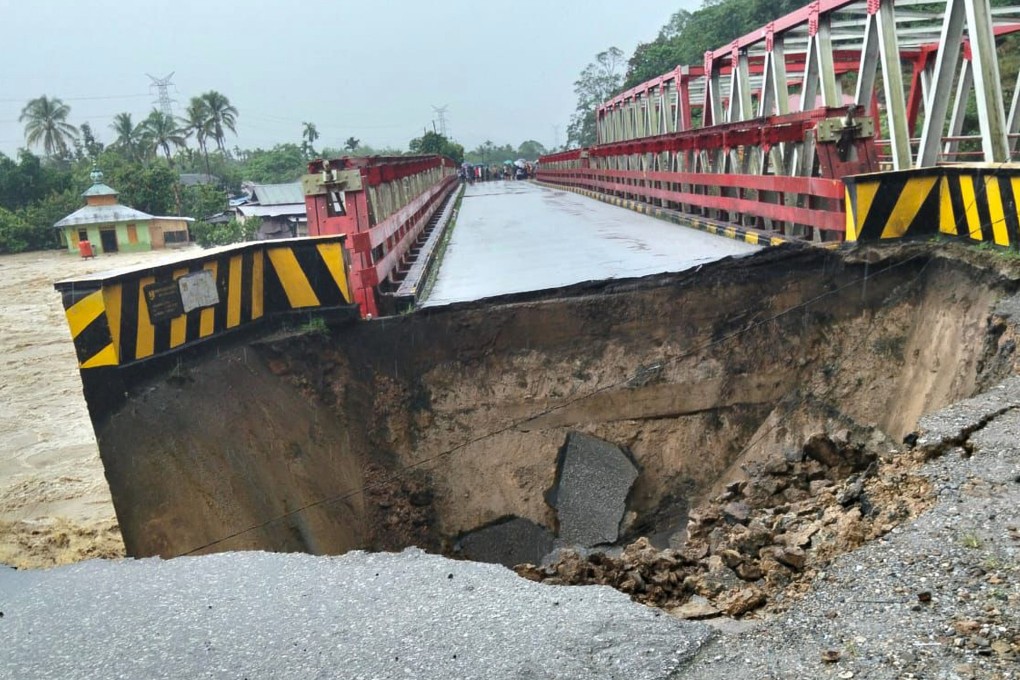 A bridge is destroyed by a flash flood in North Tapanuli, North Sumatra Province, Indonesia on Tuesday. Photo: National Agency for Disaster Countermeasure/AP