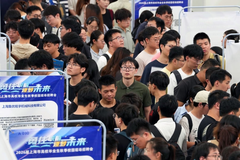University graduates stroll through a job fair held at the Minhang campus of Shanghai Jiao Tong University on September 26. Photo: Xinhua