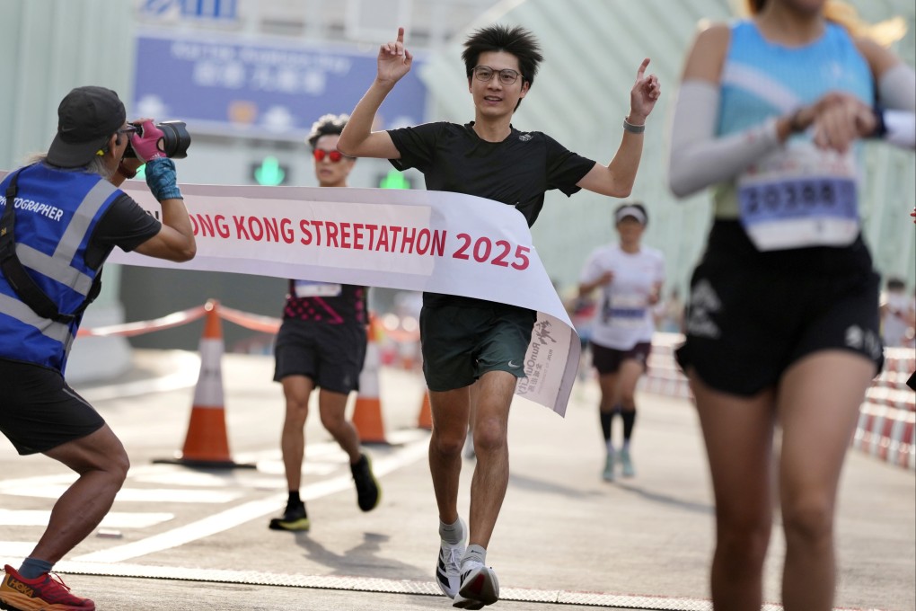 Alex Yu, winner of the Streetathon marathon, crosses the finish line on Sunday. Photo: Karma Lo