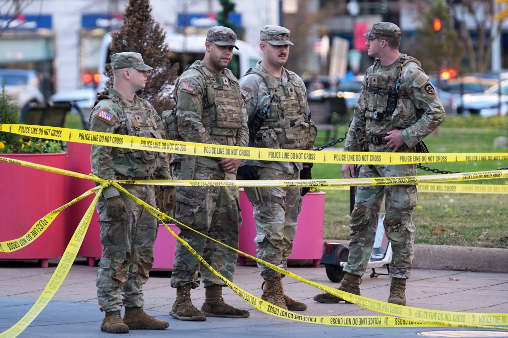 National Guard members are seen after reports of a shooting near the White House in Washington on Wednesday. Photo: AP