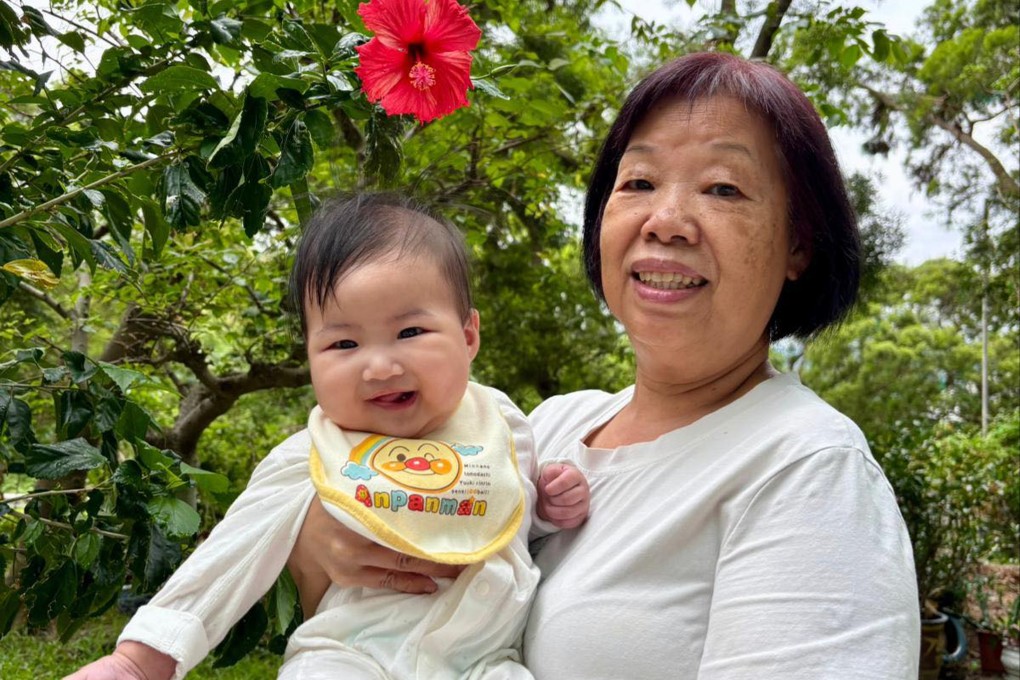 Six-month-old Ho Tsz-yan and her grandmother. Photo: Handout
