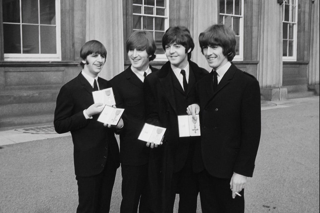 The Beatles visit Buckingham Palace to receive their MBEs in 1965, as seen in the remastered The Beatles Anthology. Photo: TNS