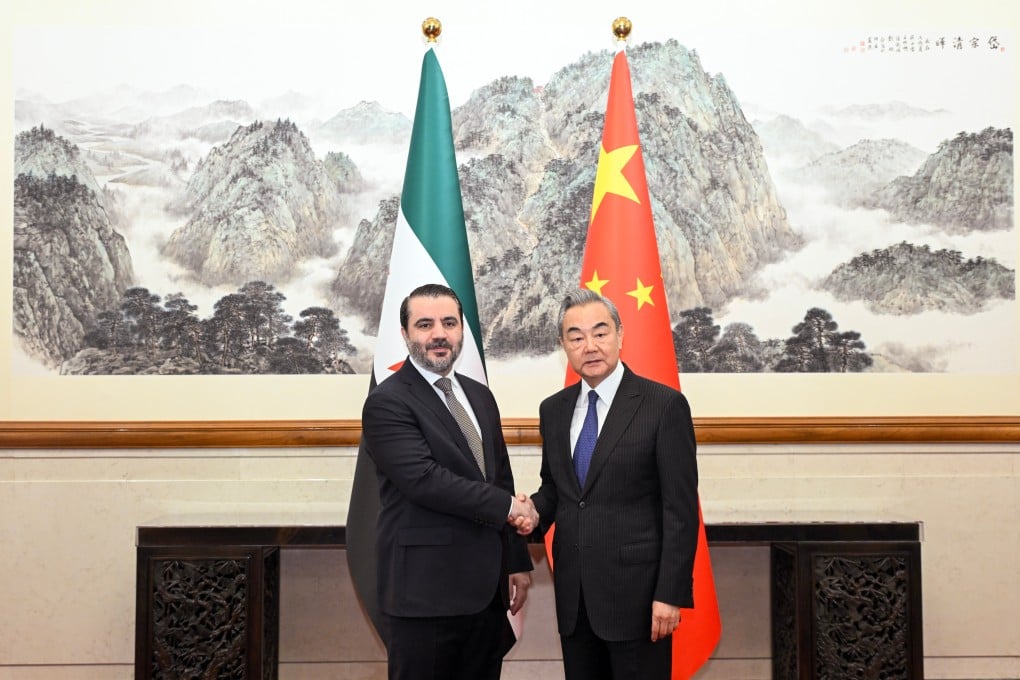 Chinese Foreign Minister Wang Yi with Syrian counterpart Asaad al-Shaibani ahead of their meeting in Beijing on November 17. Photo: Xinhua