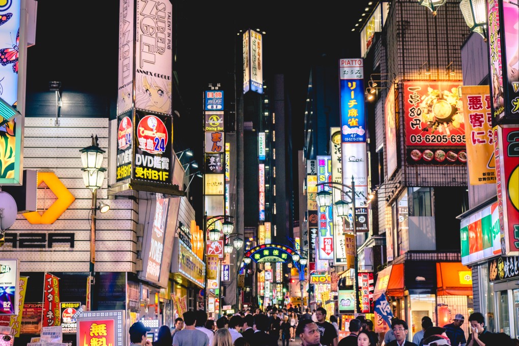 People walk through Tokyo’s Shinjuku district, a major nightlife and shopping area popular with visitors. Photo: Shutterstock