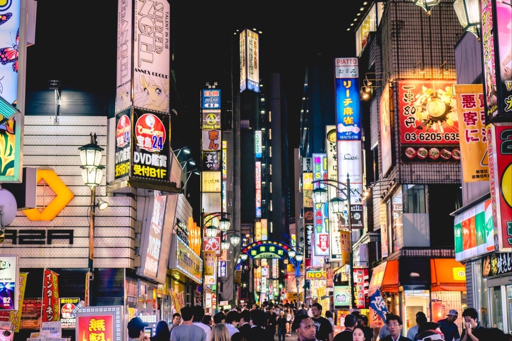 People walk through Tokyo’s Shinjuku district, a major nightlife and shopping area popular with visitors. Photo: Shutterstock