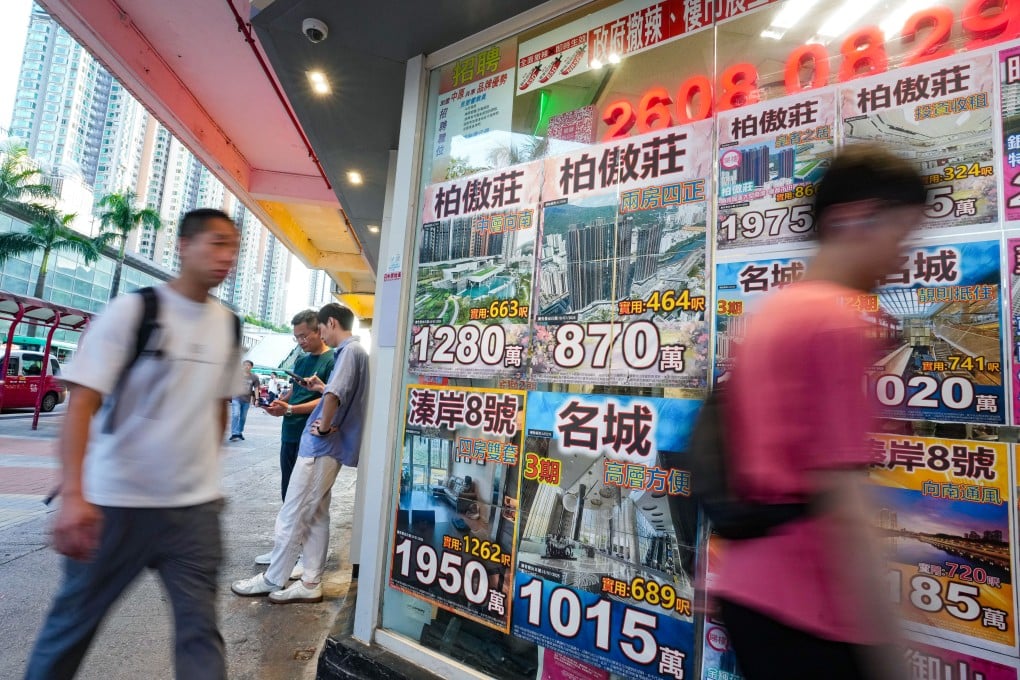 Homes for sale are displayed in the window of a property agency in Tai Wai on September 2, 2025. Photo: Sam Tsang