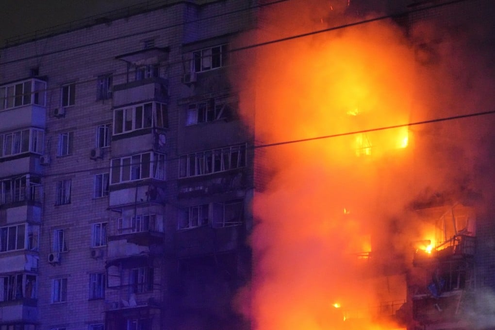 A fire burns at a residential building after a Russian attack in Vyshgorod, outside of Kyiv early on Sunday. Photo: AP