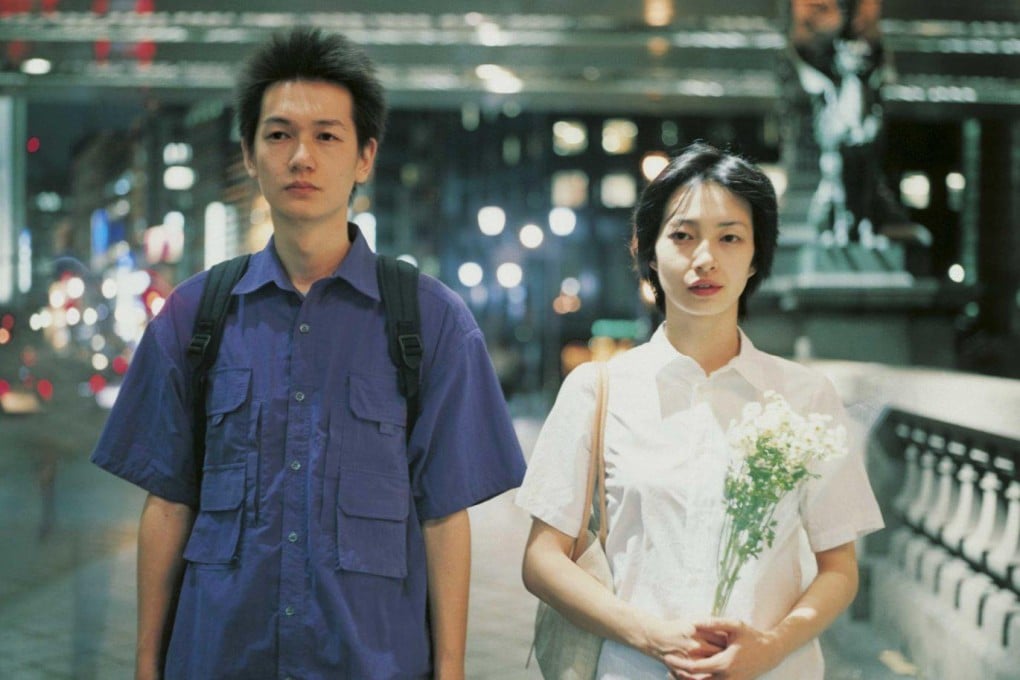 Arata Iura (left) and Ryo in a still from Distance (2001), which was conceived in the aftermath of the sarin gas attack on the Tokyo subway system, carried out in March 1995 by the Aum Shinrikyo doomsday cult.