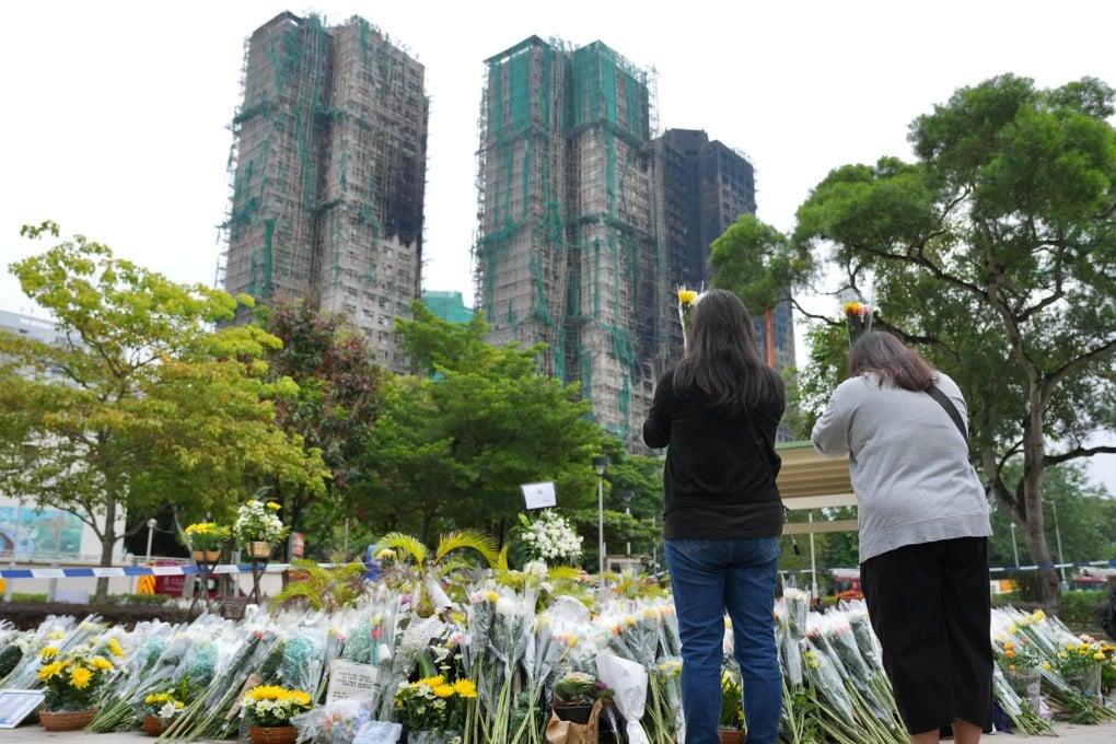 Residents pay tributes and mourn the victims of the fatal fire in Tai Po. Photo: Karma Lo