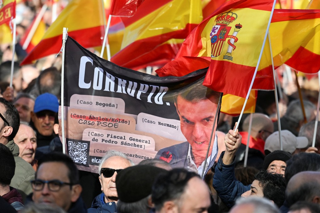 Protesters attend a rally where Spain’s opposition leader Alberto Nunez Feijoo demands snap elections after former Transport Minister Transport Minister Jose Luis Abalos was jailed over a corruption scandal dogging the Prime Minister Pedro Sanchez’s government, in Madrid, Spain on Sunday. Photo: Reuters
