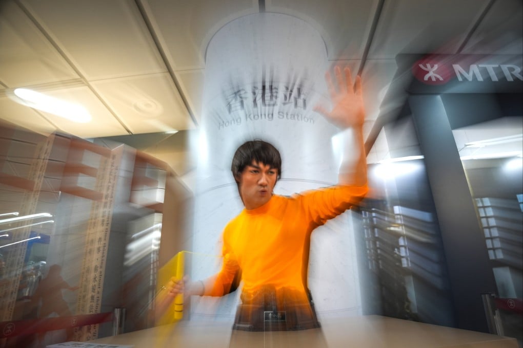 A Bruce Lee sculpture is showcased at “The Formless Way: Memorialising 85 years since Bruce Lee’s birth”, in Hong Kong Station on November 25. Photo: Eugene Lee