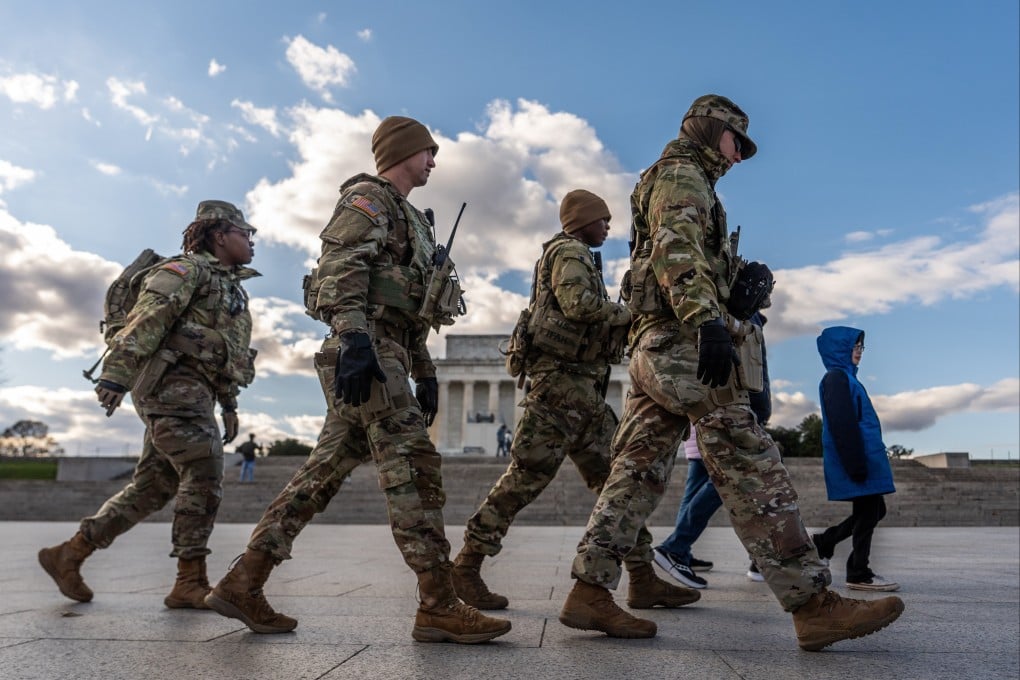 Members of the National Guard patrol in front of the Lincoln Memorial in Washington. Photo: AP