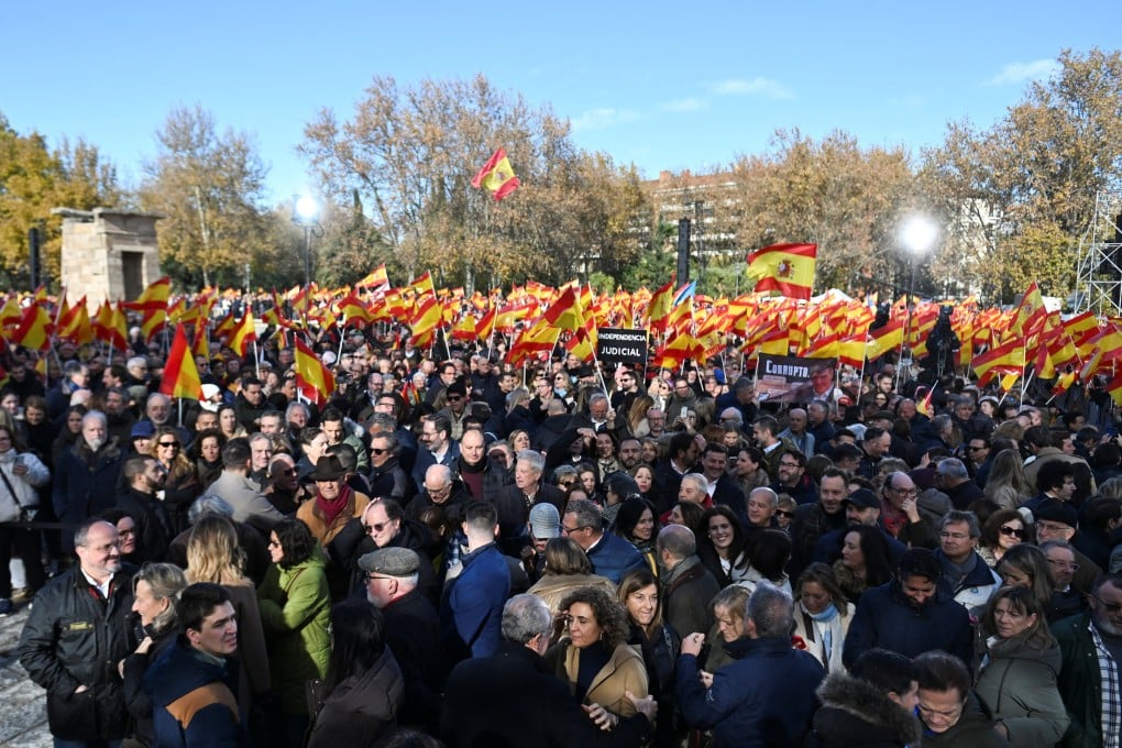 People at demonstration in Madrid on Sunday. Photo: Reuters