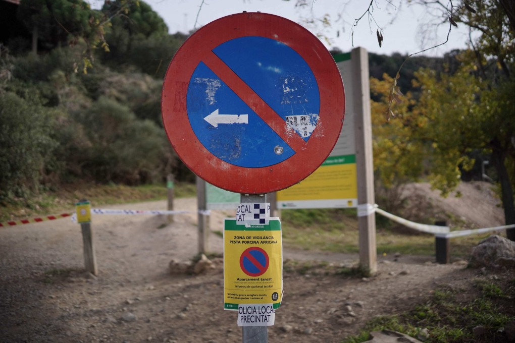 A warning sign reading ‘African Swine Fever Surveillance Zone’, near Barcelona. Photo: AFP