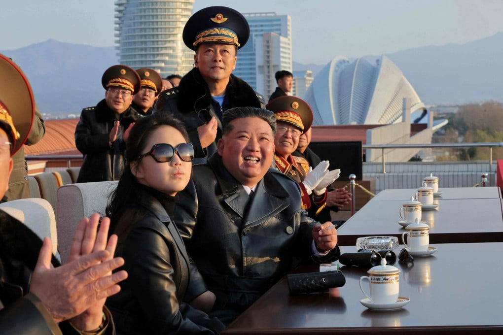 North Korean leader Kim Jong-un (centre) and his daughter Ju-ae (centre, left) watch a demonstration flight commemorating the 80th anniversary of the air force’s founding on Friday. Photo: KCNA/KNS/AFP