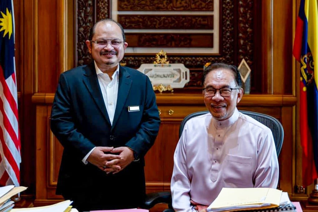 Malaysian Prime Minister Anwar Ibrahim (right) with his former senior political secretary, Shamsul Iskandar Mohd Akin. Photo: Handout