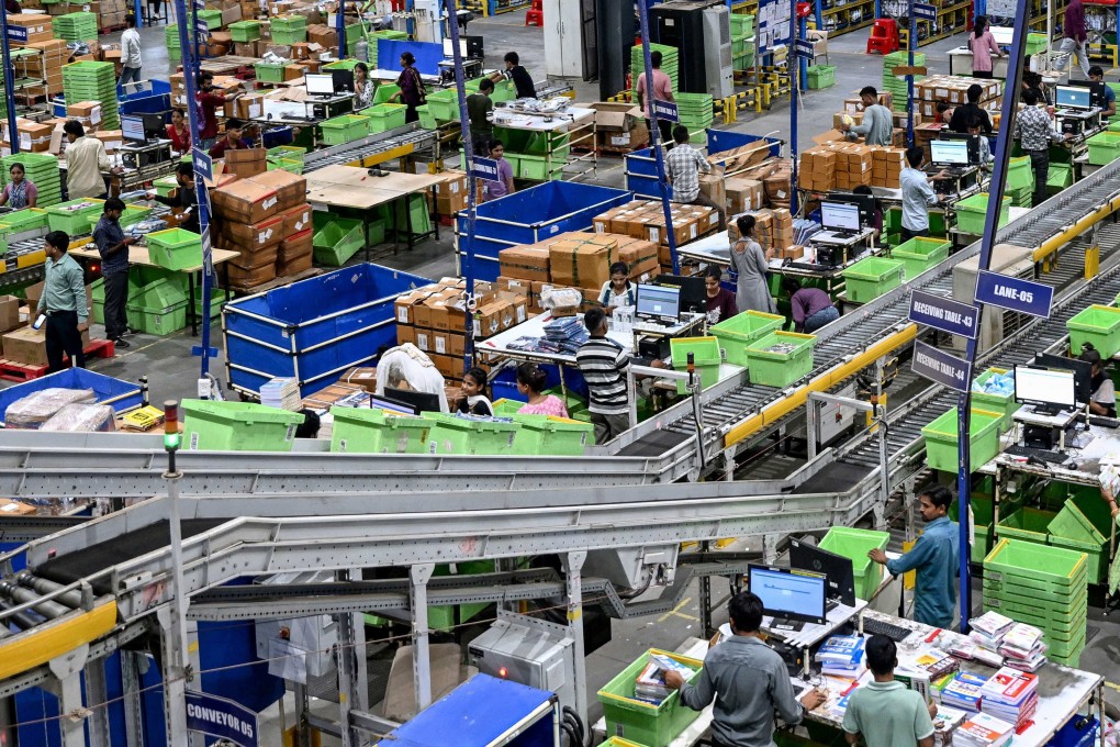 Workers scan packages ahead of dispatch from the Flipkart fulfillment centre in Haryana. Domestic consumer demand is a key pillar of India’s economy. Photo: AFP