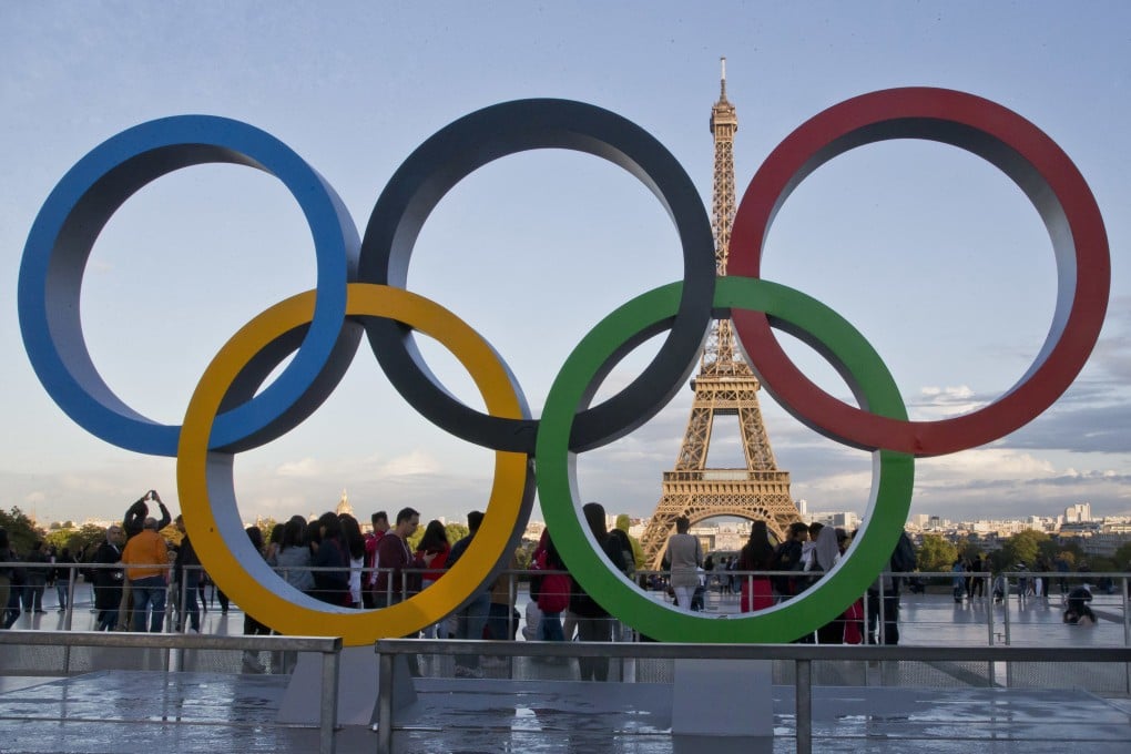 The Eiffel Tower looms behind the Olympic rings during last year’s Paris Olympics. Photo: AP