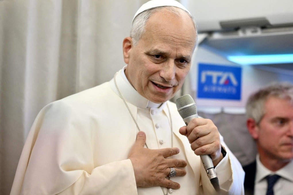 Pope Leo speaks to journalists aboard a flight to Rome on Tuesday. Photo: AFP