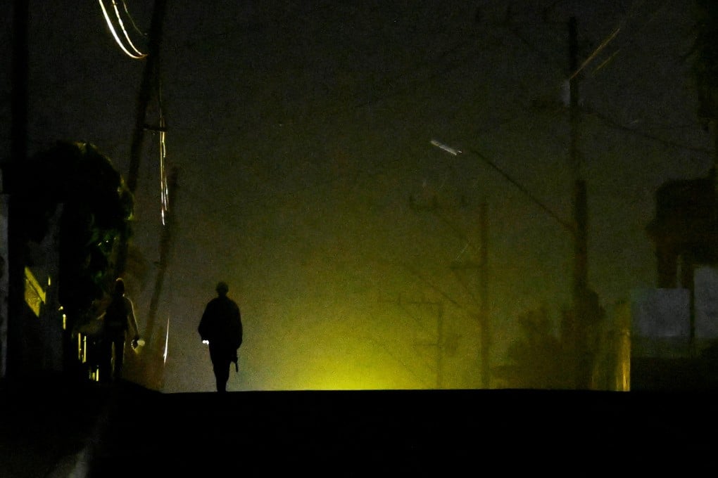A man walks on the street during a blackout in Havana, Cuba, last month. Photo: Reuters