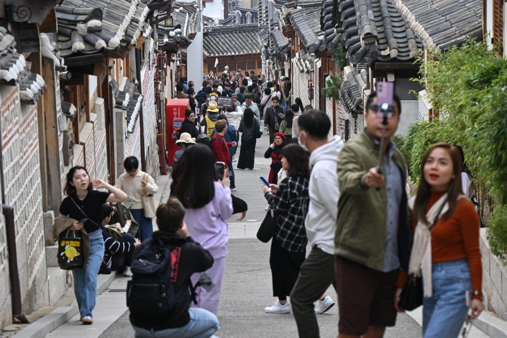 An alley crowded with tourists in central Seoul’s Bukchon Hanok Village. Photo: Korea Times