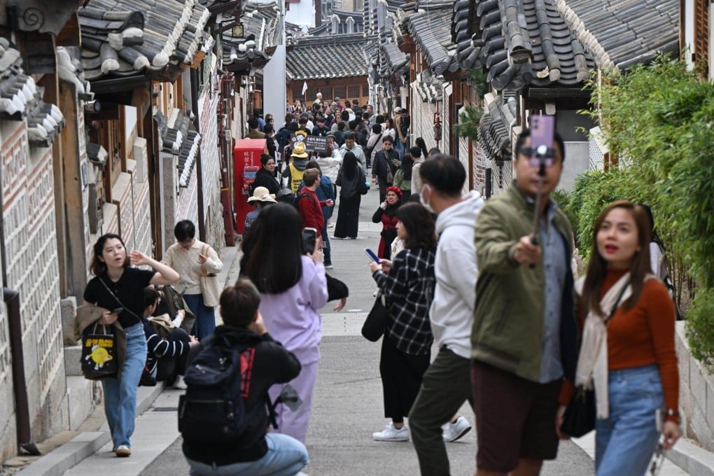 An alley crowded with tourists in central Seoul’s Bukchon Hanok Village. Photo: Korea Times