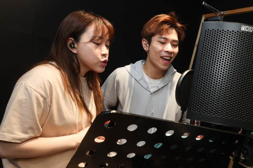 Singers Chloe Wong (left) and Marco Tang are part of the 17-person troupe responsible for “Wicked in Canto”, a series of videos featuring songs from the global musical phenomenon performed in Cantonese. Photo: Edmond So
