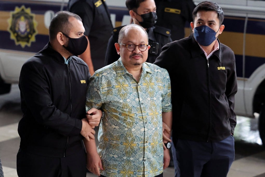 Shamsul Iskandar Mohd Akin, former senior political secretary to Prime Minister Anwar Ibrahim, brought to the Kuala Lumpur Court Complex by Malaysian Anti-Corruption Commission officers on Monday. Photo: Reuters