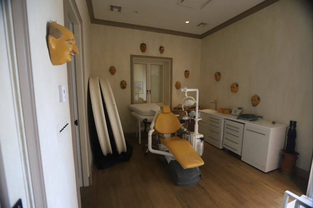 A room with what looks like a dentist chair and masks on the walls. Photo: House Oversight Committee via Reuters