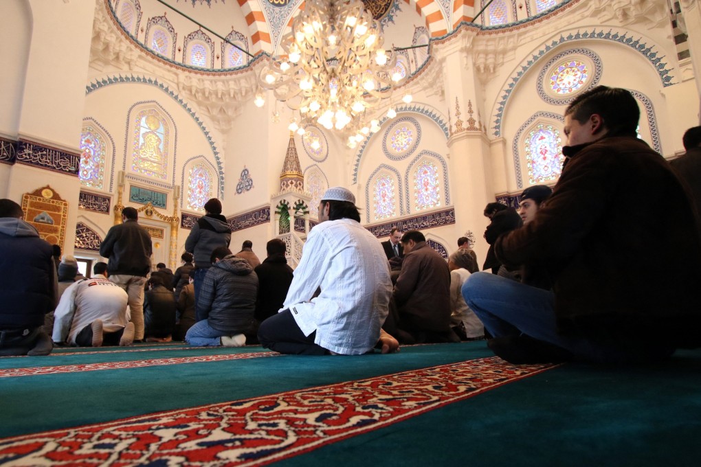 Muslim residents of Japan gather for a Friday service at Japan’s largest mosque in Tokyo in 2015. Photo: AFP