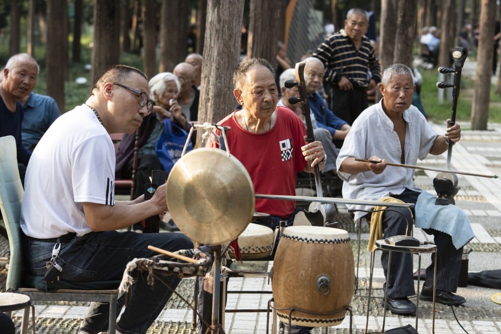 Elderly people relax at a park in Fuyang in China’s Anhui province on October 9. Photo: CFOTO/Future Publishing via Getty Images