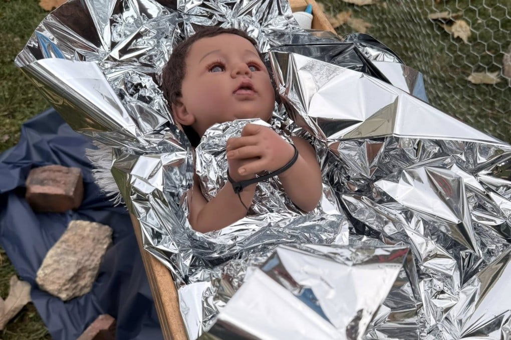 A nativity scene in suburban Chicago features Baby Jesus bound with zip ties and wrapped in an aluminum foil-like blanket. Photo: Facebook/Lake Street Church of Evanston