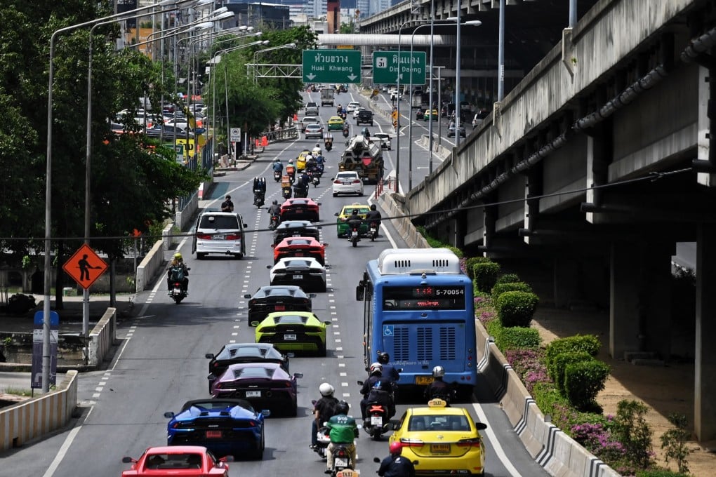 A convoy of Lamborghinis leaves Bangkok en route to Pattaya. Scam proceeds wash up in the pool villas of Bangkok, the restaurants of Phnom Penh and the supercars of Vientiane. Photo: AFP