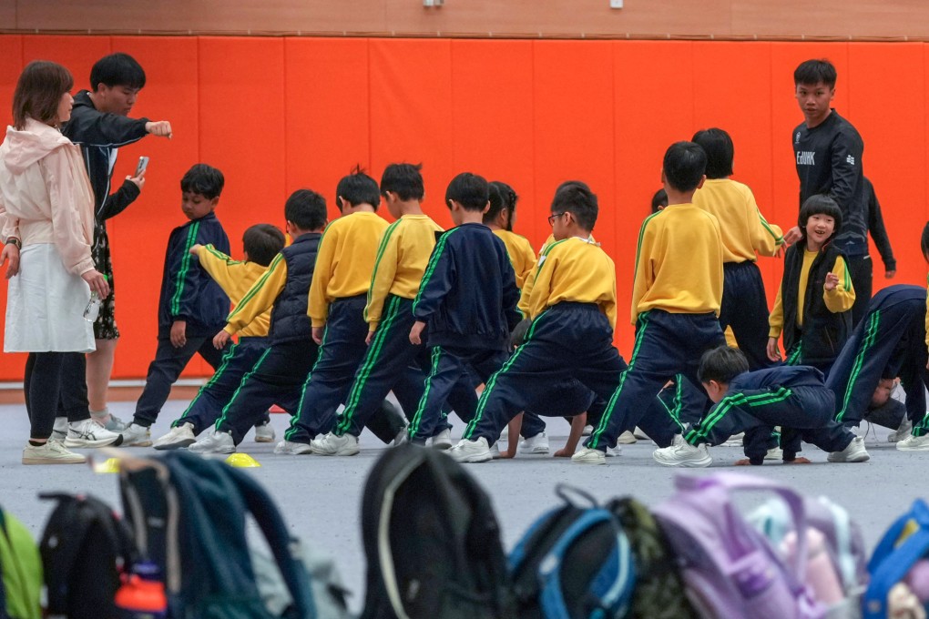 Tai Po Baptist Public School pupils enjoy a physical education class held in the Education University gymnasium. Photo: Jelly Tse