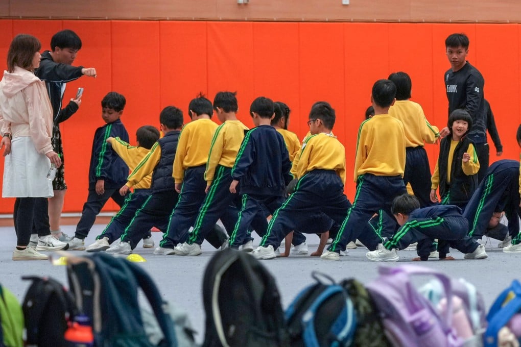 Tai Po Baptist Public School pupils enjoy a physical education class held in the Education University gymnasium. Photo: Jelly Tse