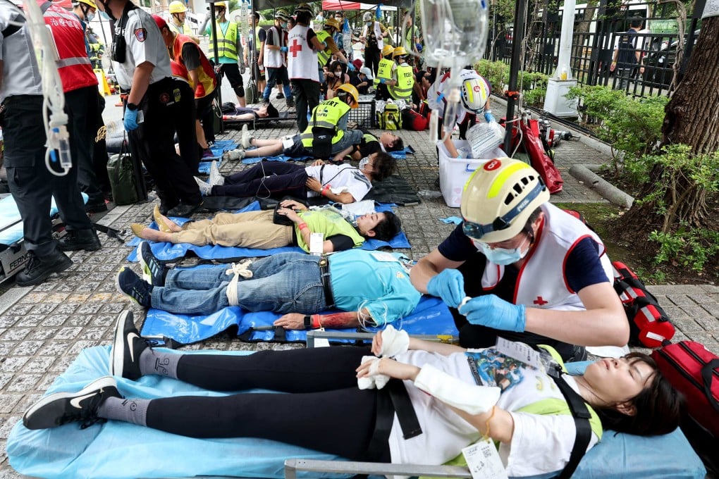 People take part in a mass casualty evacuation drill during Taiwan’s annual Han Kuang military exercises in Taipei on July 17. Photo: AFP