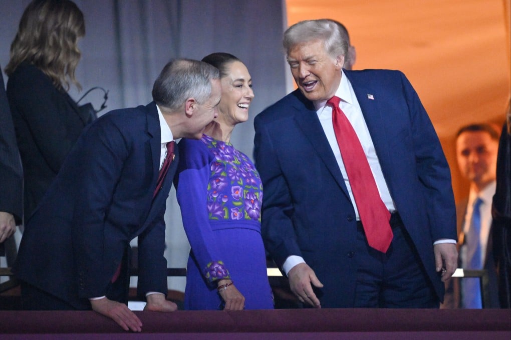 US President Donald Trump speaks with Canadian Prime Minister Mark Carney and Mexican President Claudia Sheinbaum after the draw for the 2026 soccer World Cup in Washington on Friday. Photo: AP