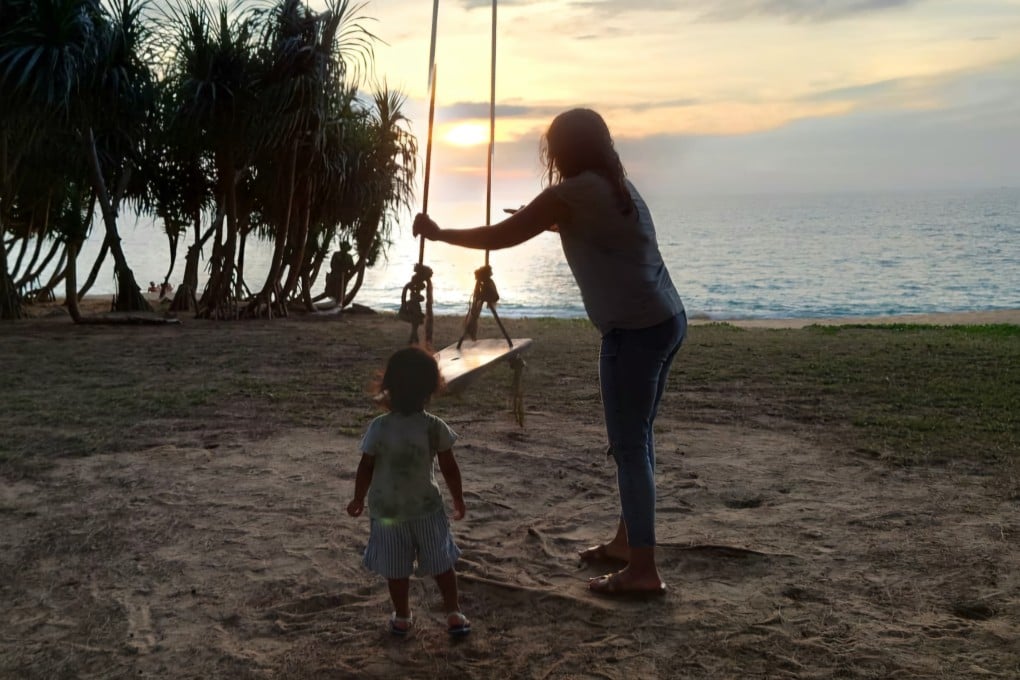 Asha plays with her child. The high-flying marketing executive started off knowing all about positive stress, but a battle with cancer, a new baby and an alcoholic husband saw her have to learn new ways to overcome her mental tension. Photo: Asha
