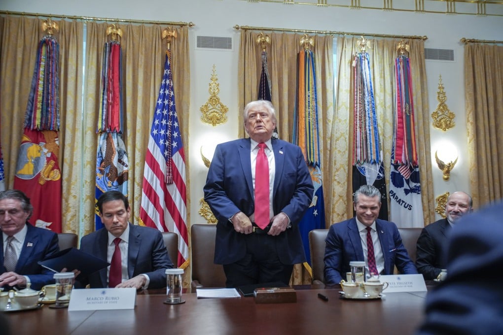US President Donald Trump stands during a cabinet meeting at the White House on Tuesday. Photo: EPA