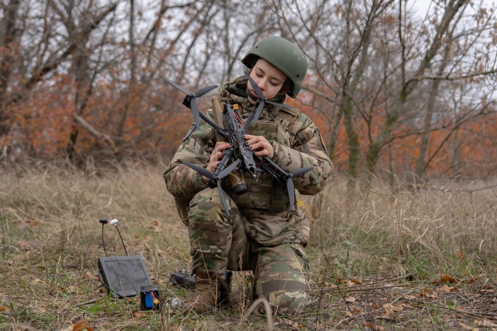 Monka, an FPV drone operator from the third assault brigade, assembles an FPV drone in November, in Kharkiv Oblast, Ukraine. Photo: AP