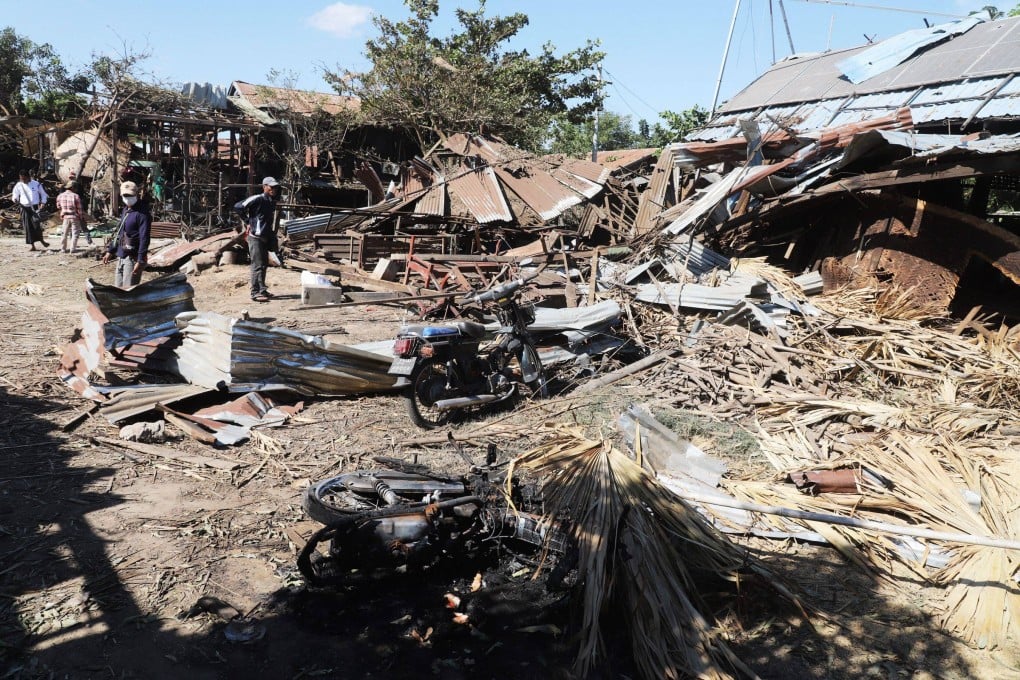 People inspect their damaged home after bombardments carried out by Myanmar’s military in Tabayin, in Myanmar’s Sagaing region, on Saturday. Photo: AFP