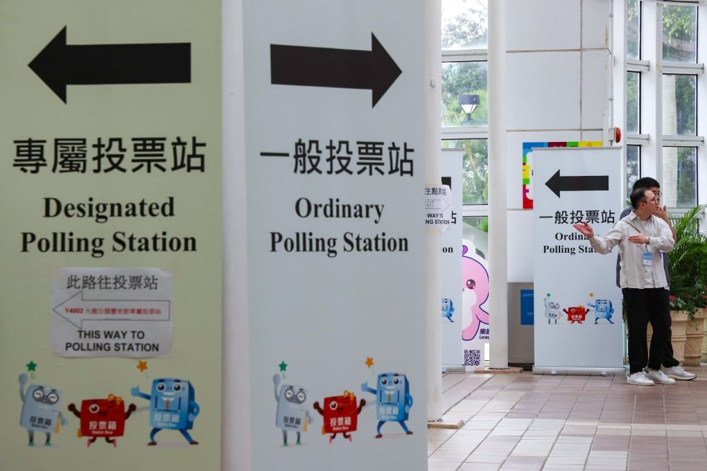 Staff members on duty at Kowloon Park Sports Centre polling station. Photo: Jelly Tse