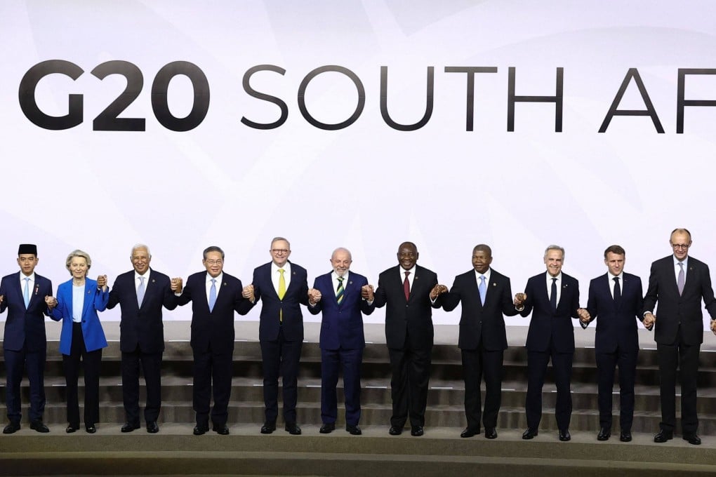 Chinese Premier Li Qiang (fourth left) poses with African and other G20 leaders, in Johannesburg on November 22. He has said Beijing is willing to work with South Africa to promote the early implementation of zero-tariff treatment for its goods. Photo: AFP