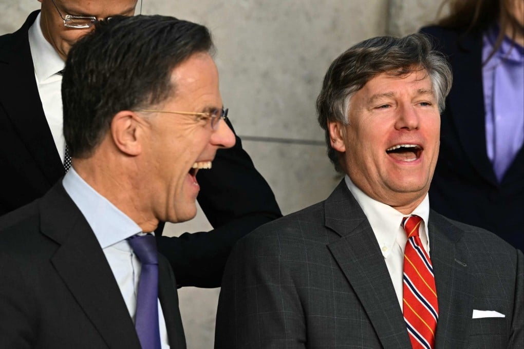 Nato chief Mark Rutte (left) shares a laugh with US Deputy Secretary of State Christopher Landau in Brussels on Wednesday. Photo: AFP
